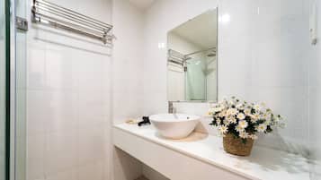 Panoramic Studio, City View | Bathroom | Shower, rainfall showerhead, hair dryer, slippers