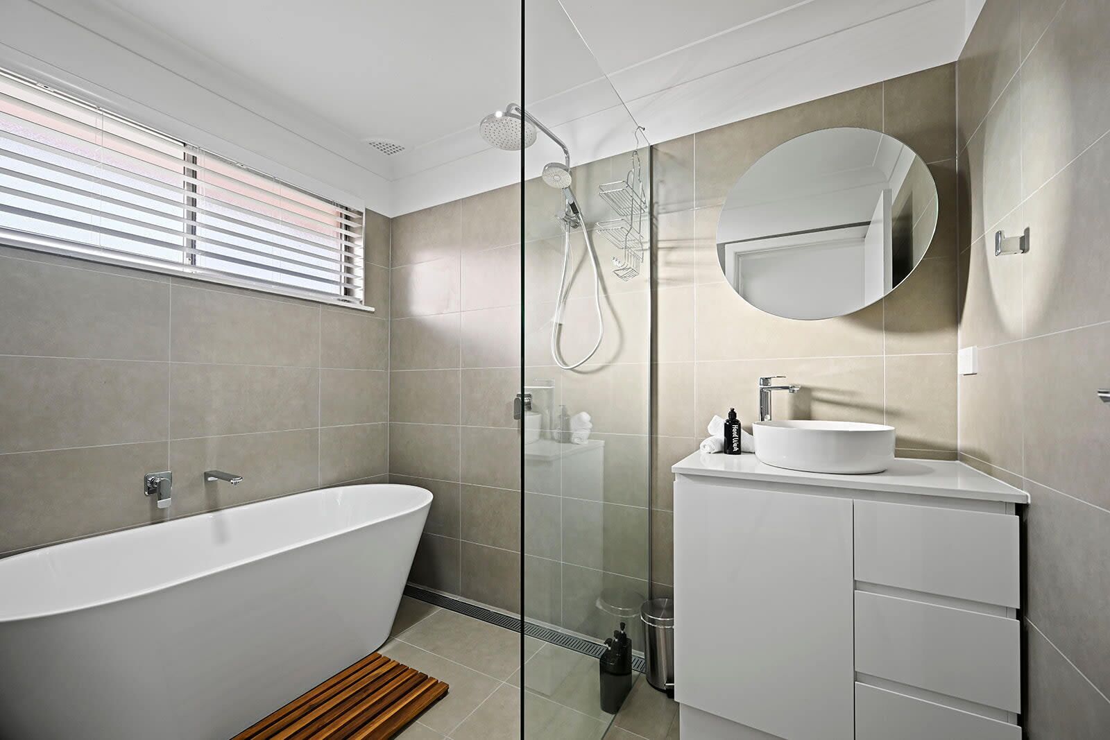 Shower, hair dryer, towels, shampoo
