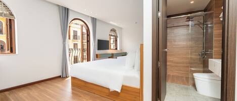 Suite familiar, vistes a la ciutat | 1 dormitori, habitacions insonoritzades, wifi gratuïta i roba de llit