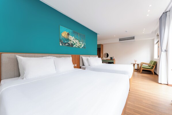 Suite familiar, vista a la ciudad | 1 habitación, insonorización, wifi gratis y ropa de cama