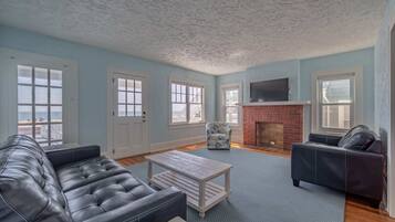 Basic Apartment | Living area | 32-inch Smart TV with cable channels