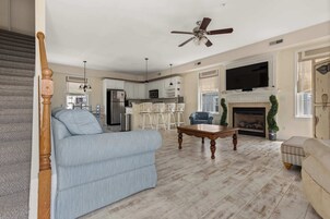 Basic Townhome | Living area | 32-inch Smart TV with cable channels