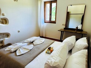 1 slaapkamer, een strijkplank/strijkijzer, wifi, beddengoed