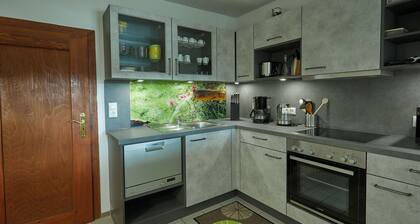 Ferienhaus 'Haus Am Brunnen' auf 100 qm mit privatem Garten und WLAN