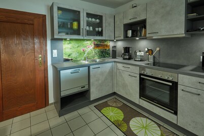 Holiday home 'Haus Am Brunnen' on 100 sqm with private garden and WiFi