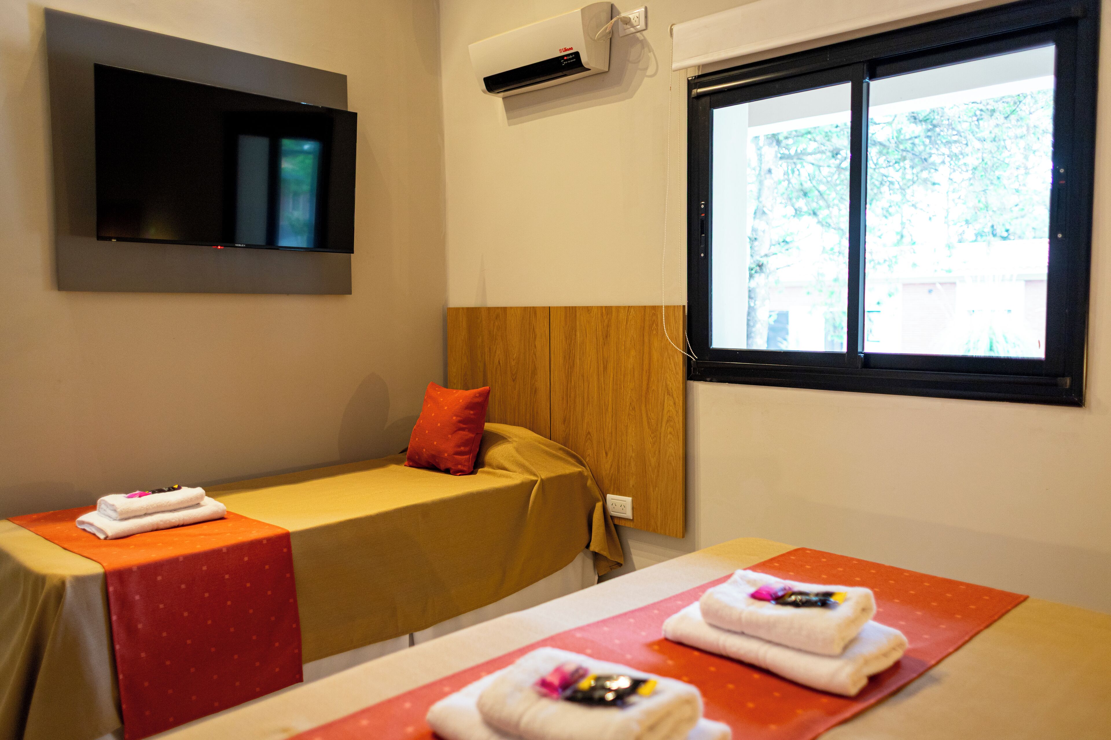 Standard Triple Room, Multiple Beds | Courtyard view