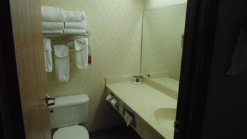 Shower, rainfall showerhead, towels, soap