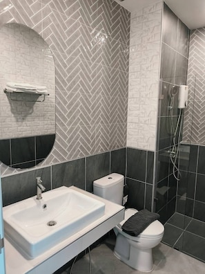 Standaard kamer | Badkamer | Handdoeken, zeep, shampoo, toiletpapier