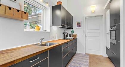 Summer house brimming with activity and coziness.