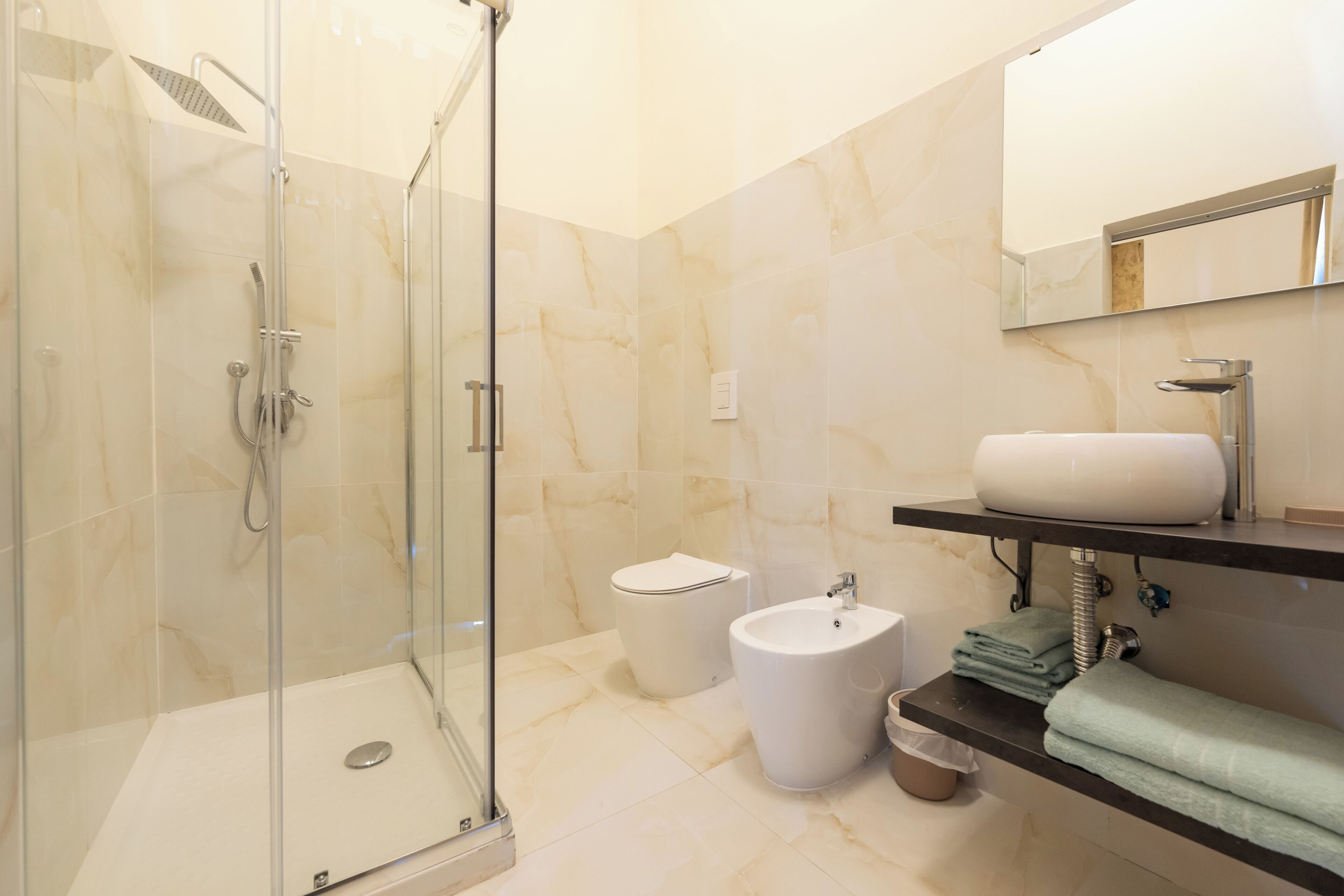 Shower, jetted tub, hair dryer, bidet