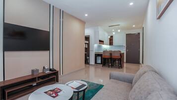 Superior Suite | Living area | 42-inch LCD TV with satellite channels