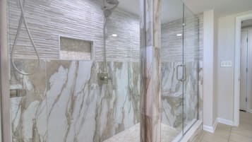 Shower, towels, toilet paper
