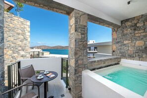 Premium Room with Jetted Tub & Partial Sea View | Terrace/patio - Elounda Stories Boutique Hotel (Agios Nikolaos)
