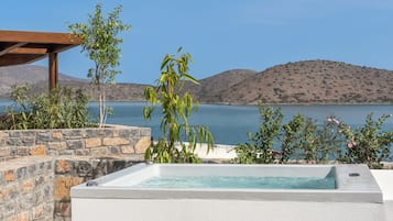 Junior Suite with Outdoor Jetted Tub & Sea View | 1 bedroom, in-room safe, soundproofing, iron/ironing board