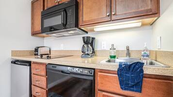 Microwave, stovetop, dishwasher, coffee/tea maker