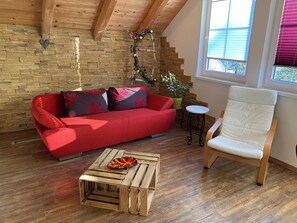TV - Komfortable Ferienwohnung mit Charme. Optimal für Familien, Paare und Freunde (Bad Goisern am Hallstättersee)