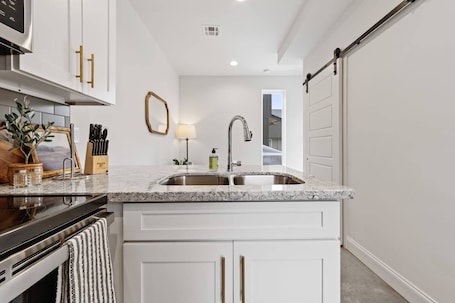 Fridge, microwave, oven, stovetop. Charming Townhome - Built in 2023