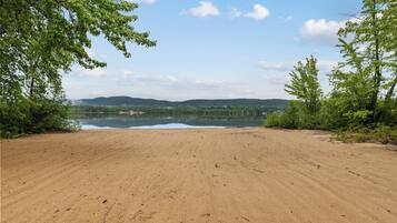 On the beach, sun-loungers, beach towels