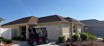 Stylish villa with golf cart, BBQ, near pool & shops in tranquil setting!
