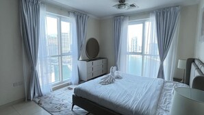 Departamento Confort, balcón, vista al lago | 1 habitación, tabla de planchar con plancha y wifi gratis 