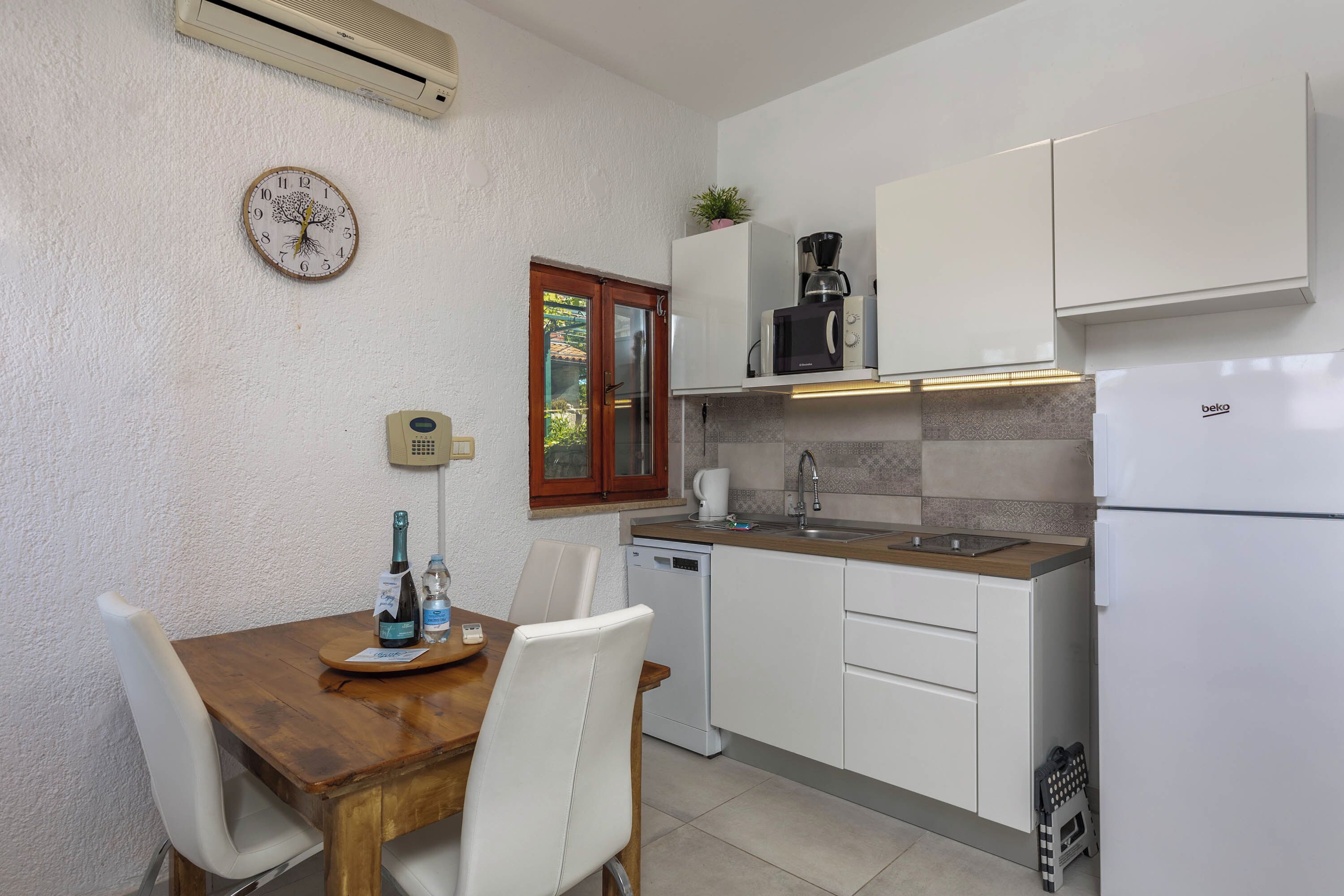Family Studio (Holiday Home Sladonja - Apartment 02) | Private kitchen | Fridge, microwave, stovetop, dishwasher