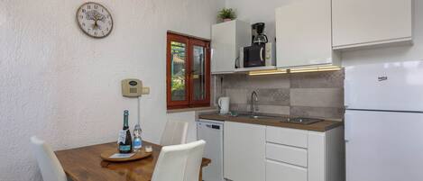 Family Studio (Holiday Home Sladonja - Apartment 02) | Private kitchen | Fridge, microwave, stovetop, dishwasher