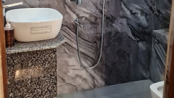 Shower, towels, soap, shampoo