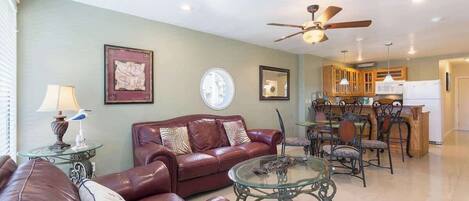 Condo, Multiple Beds, Balcony, Pool View | Living area | 42-inch flat-screen TV with digital channels