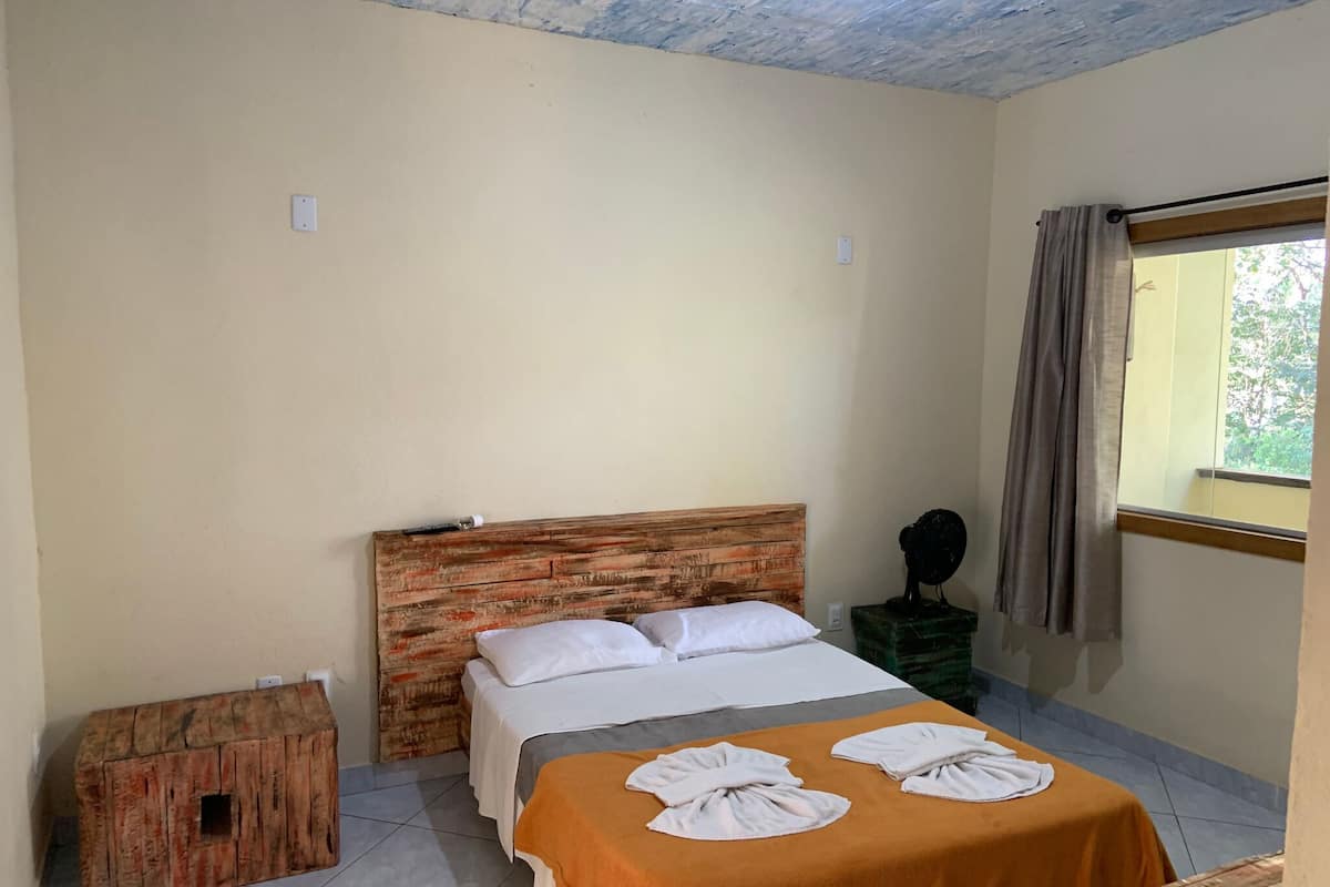 Traditionele kamer, veranda, uitzicht op tuin | Een minibar, gratis wifi, beddengoed