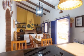 Enjoy meals in this dining area with an oven and comfortable seating.