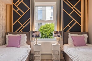 2 chambres, fer et planche à repasser, draps fournis