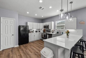 Fridge, microwave, oven, stovetop - Retreat to a Brand-New Downtown Home 4BR/3BA! (San Antonio)