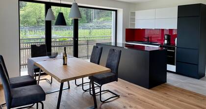 90 m² new vacation apartment with mountain view, sunny balcony and WLAN.