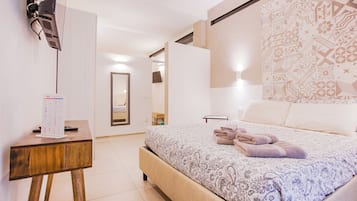 Premium bedding, down duvets, memory-foam beds, minibar