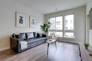 Business Apartment | Living area | 50-inch Smart TV with satellite channels - Prime Location Apartment at Alexandria (Alexandria)