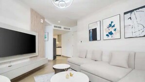 Basic Apartment | Living area - Stylish 1BD Retreat w/ Patiojumeirah Lake Towers (Dubai)