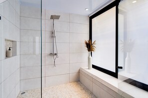 Shower, eco-friendly toiletries, hair dryer, towels