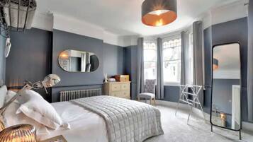 Basic House | 4 bedrooms, laptop workspace, iron/ironing board, bed sheets