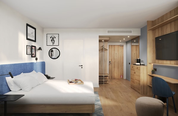 A modern bedroom with a bed, bedside table, and wall art. - Hampton By Hilton Paris Charles De Gaulle Airport (Roissy-en-France)