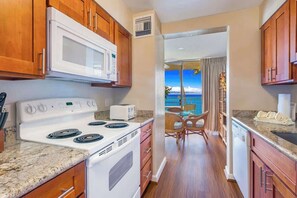 Fridge, microwave, oven, stovetop - Large Corner Oceanfront condo AC wrap around lanai (Napili-Honokowai)