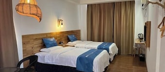 Yajiada Business Hotel (Tongren Railway Station Jinmatou)