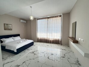 Family Apartment, 2 Bedrooms | 1 bedroom, memory-foam beds, blackout curtains, soundproofing