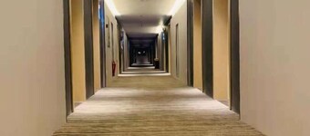 Wanjia Zhenxuan Hotel (long distance bus station)