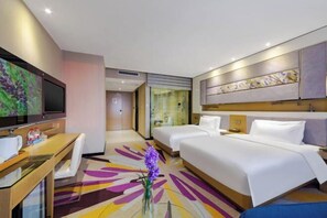 A hotel room with a bed, bedside tables, a TV, a desk, and a bathroom. - Lavande Hotel Wuhan Wujiashan 5th Ring Sports Center (Wuhan)