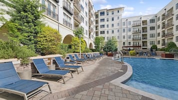 Seasonal outdoor pool, pool loungers