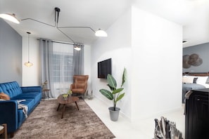 Standard Apartment, 1 King Bed, Accessible (Self Check-in with Virtual Front Desk) | Living area | Flat-screen TV