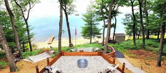 Rainbow Lake Luxury Beachfront Oasis with Hot Tub! - Hosted by Simple Lyfe Stays
