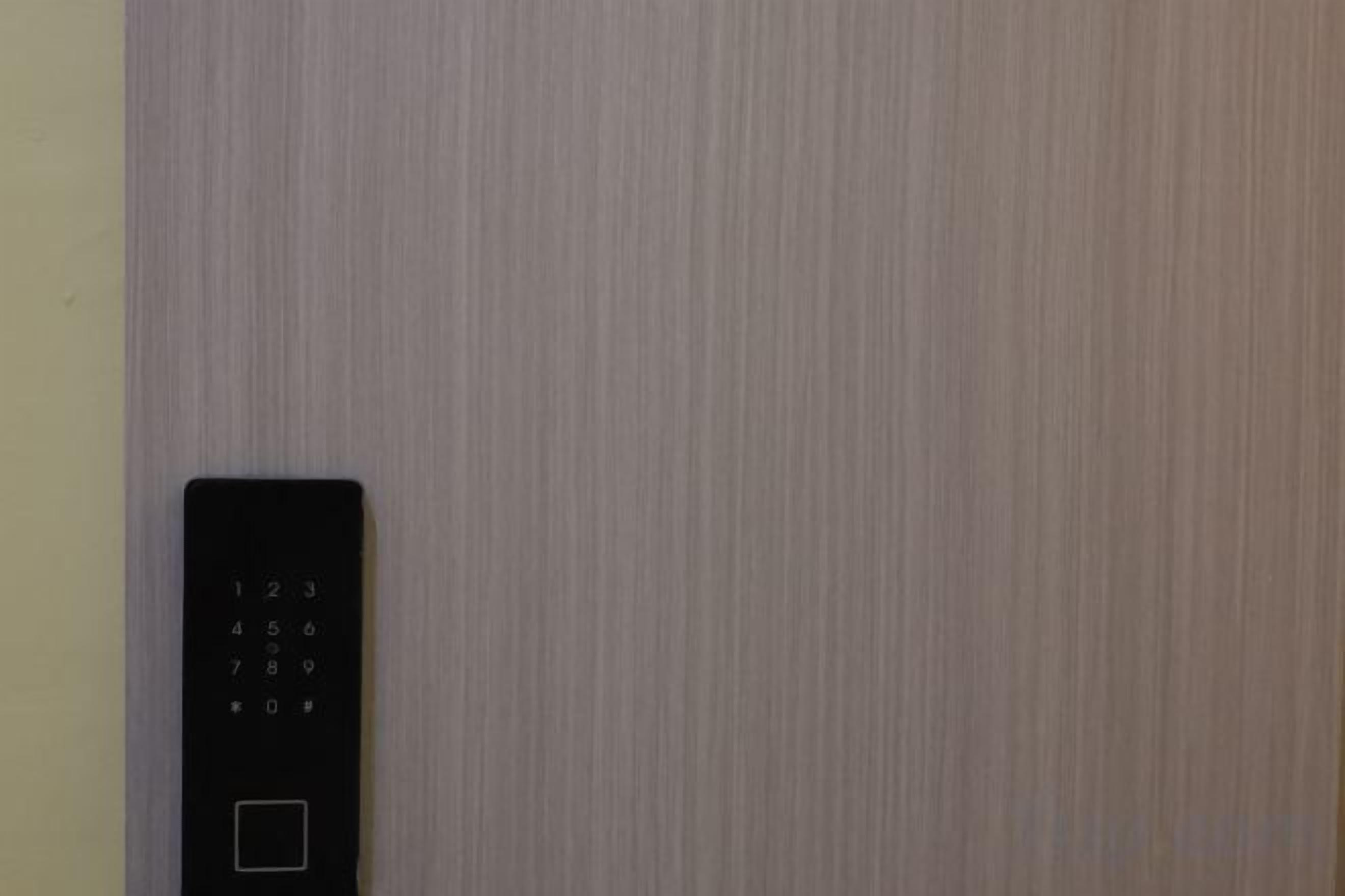A door with a keypad lock.