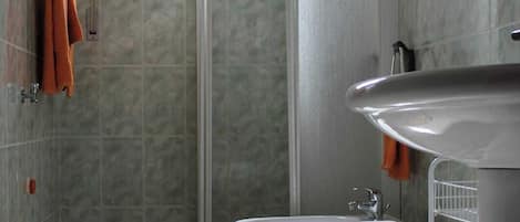 Hair dryer, bidet, towels, soap