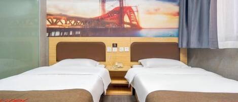 A hotel room with two beds, a wooden headboard, a nightstand, and a large window with a view of a bridge.